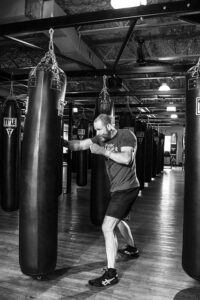 boxing-bag-gloves-640x480-29358890.jpeg